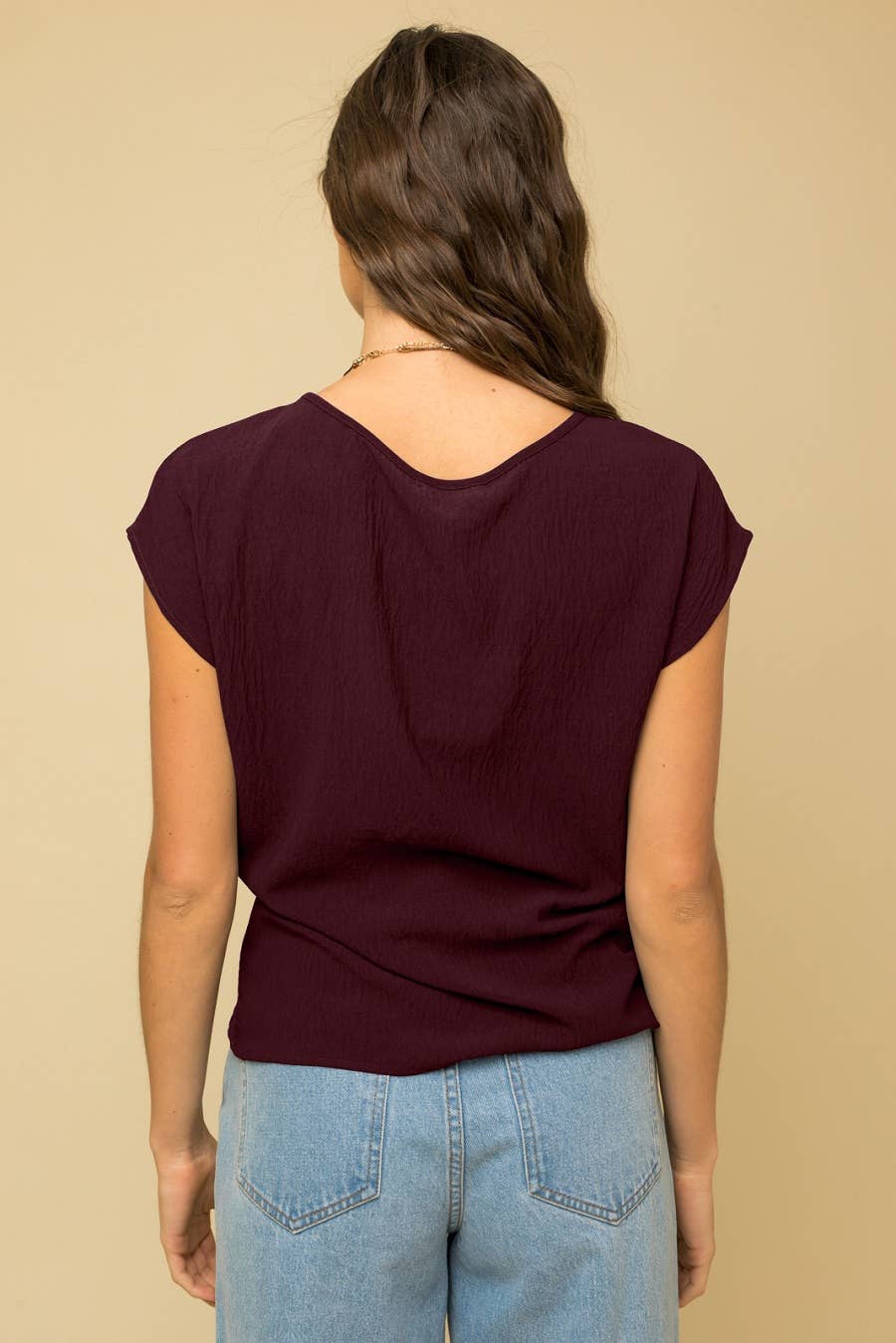SOLID WOVEN TEE WITH FRONT KNOT DETAIL