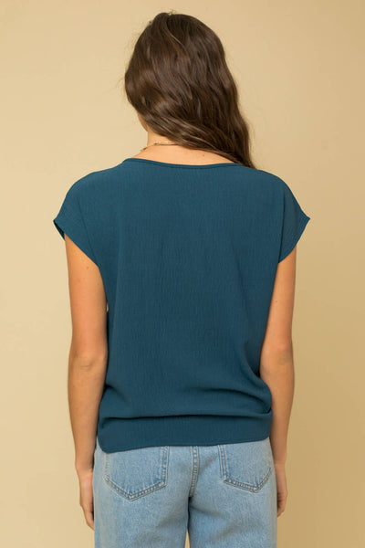 SOLID WOVEN TEE WITH FRONT KNOT DETAIL