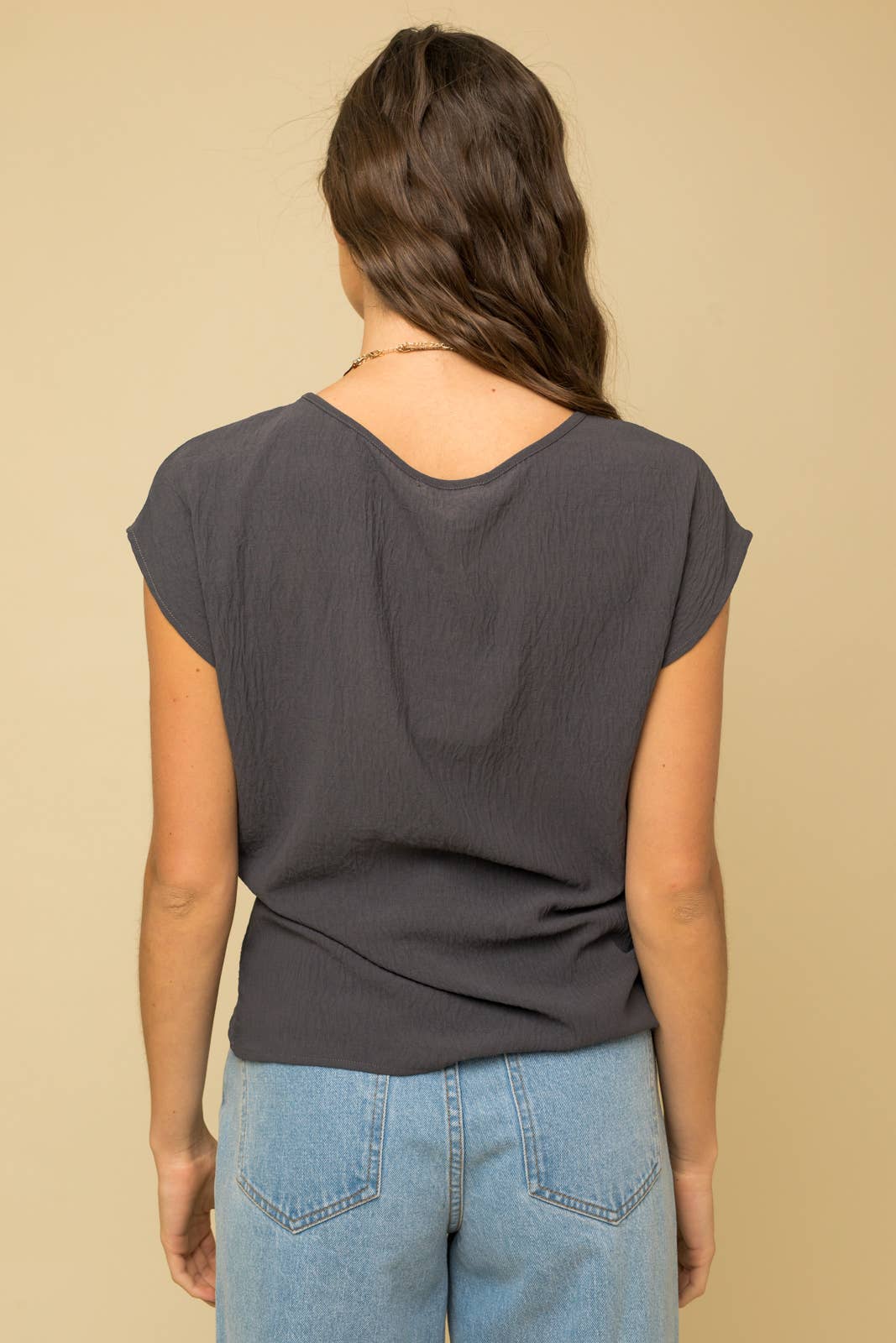 SOLID WOVEN TEE WITH FRONT KNOT DETAIL