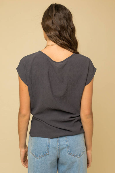 SOLID WOVEN TEE WITH FRONT KNOT DETAIL